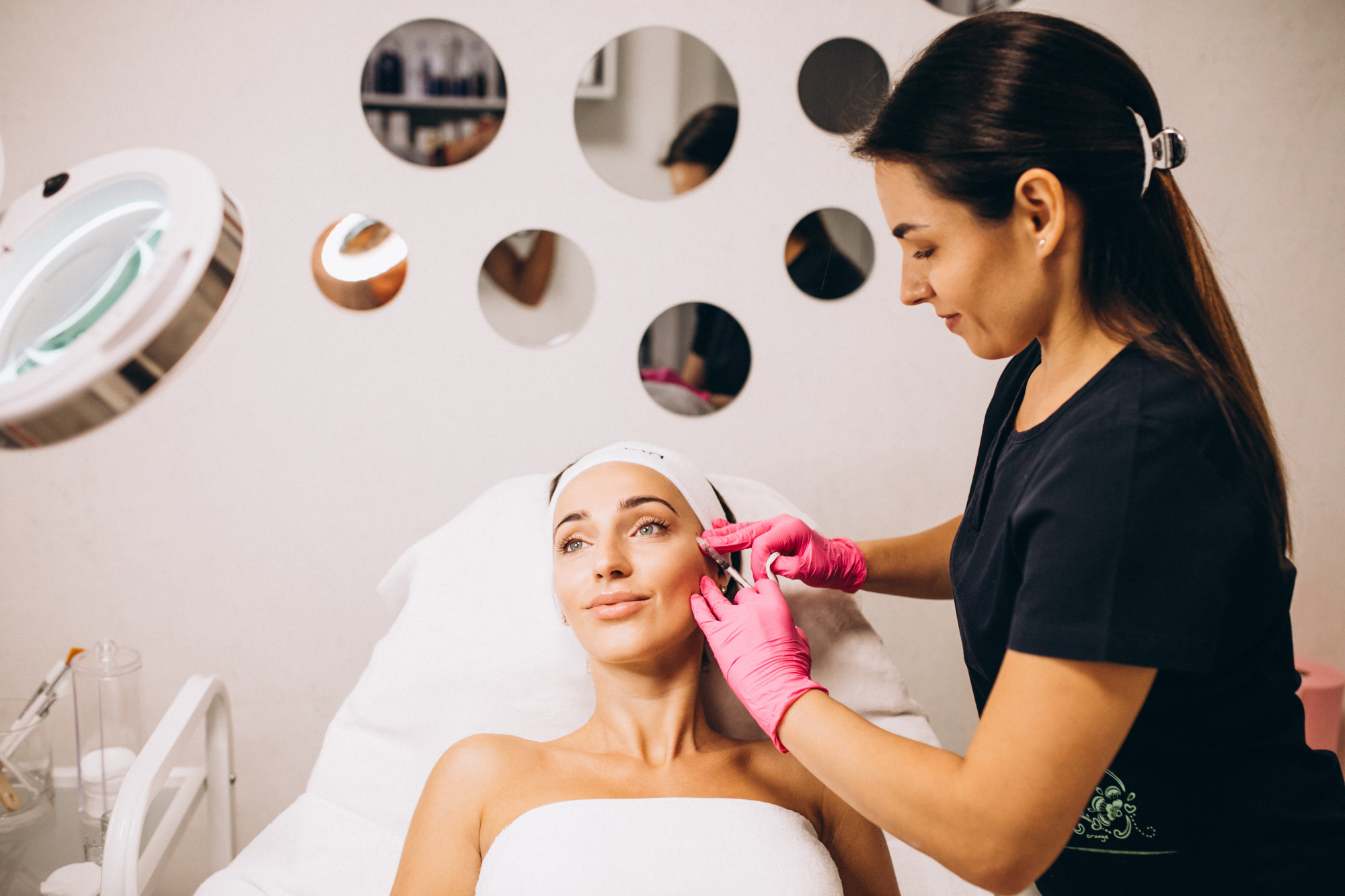 cosmetologist-making-injections-face-woman-beauty-salon